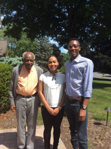 Seyvion Scott Walter Cooper and a man wearing glasses 