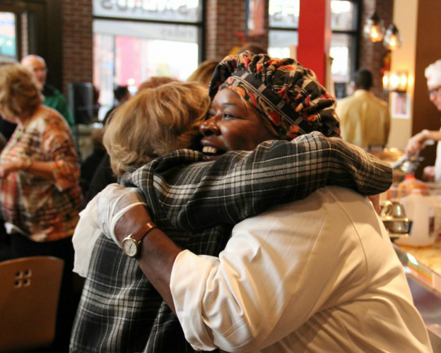 Louise Slaughter hugging a woman 