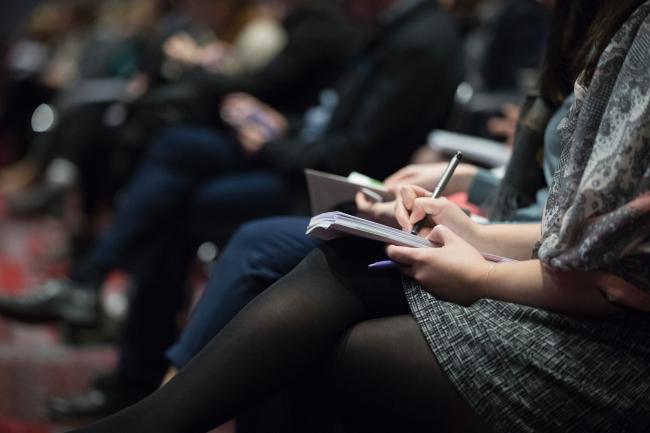 Woman taking notes