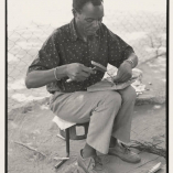 Sekuru working on an mbira