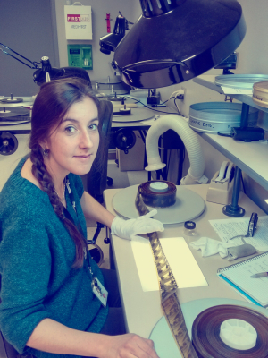 Photo of Clara Auclair working in the digitization lab in Rush Rhees