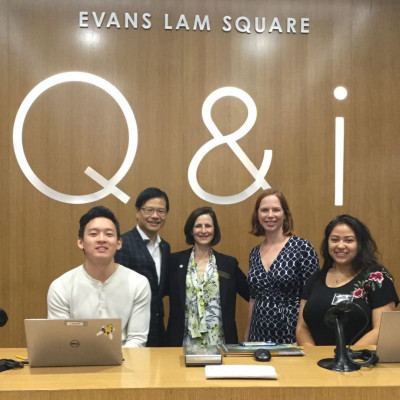 Q&i desk with Evan Lam, Mary Ann Mavrinac and other staff