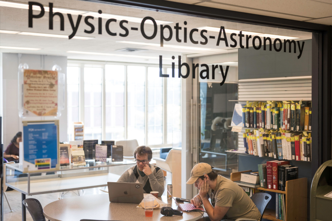 Looking into the main window of POA library from the outside hallway