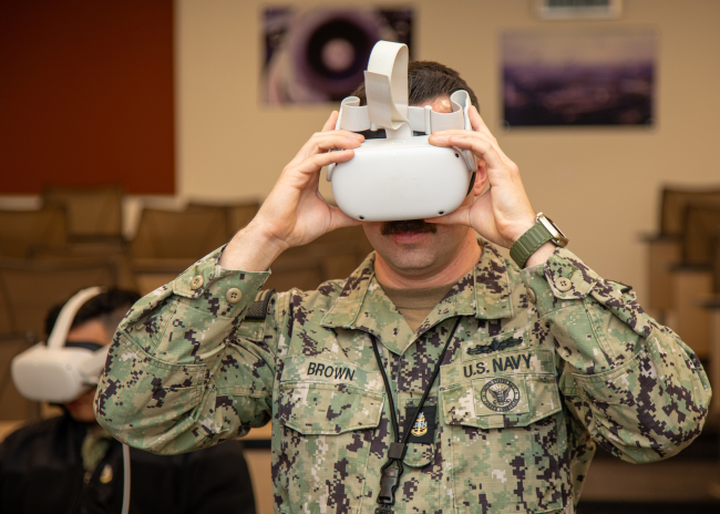 soldier tries a vr headset. 
