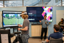 Student gives a final presentation of their project. 