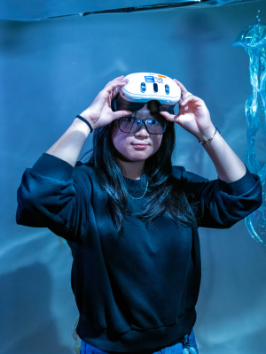 Emmie wearing Headset